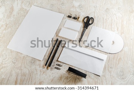 Blank stationery set. Template for branding identity on light wooden background. For design presentations and portfolios.
