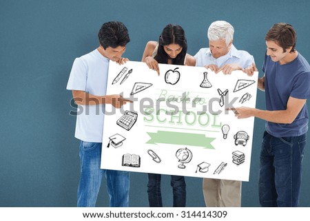 People holding and watching a big sign against blue background