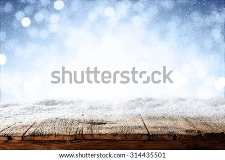 beautiful blue blurred background of winter and shabby table  Royalty-Free Stock Photo #314435501