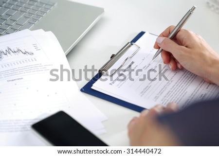 Business woman filling partnership agreement blank. Business and partnership concept