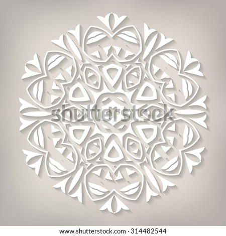 Vector light beige paper christmas snowflake on a beige background