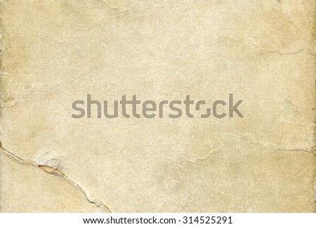 Old ragged paper texture with spots. Abstract background. 