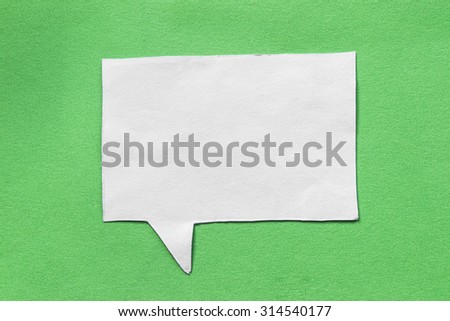 Paper blank speech bubble on green background