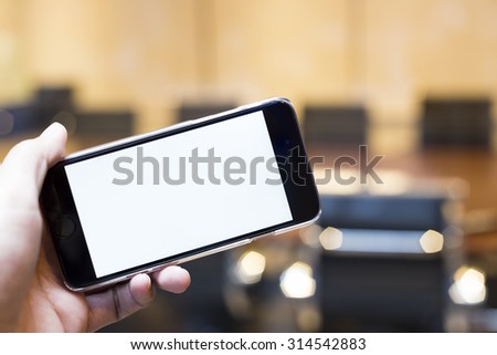 Using Mobile Phone - soft focus Royalty-Free Stock Photo #314542883