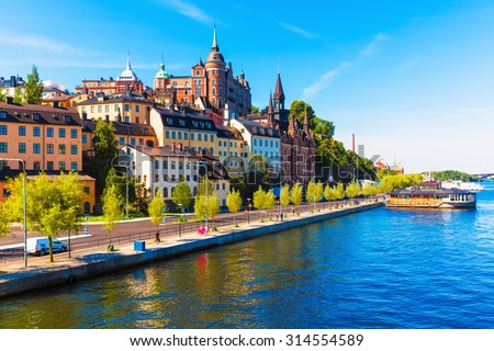 Scenic summer view of the Old Town pier architecture in Sodermalm district of Stockholm, Sweden Royalty-Free Stock Photo #314554589