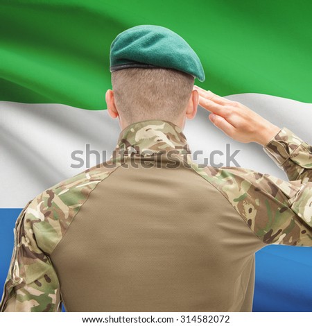Soldier in hat facing national flag series - Sierra Leone