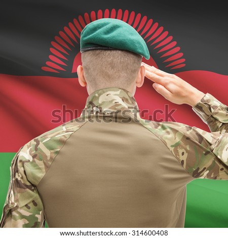 Soldier in hat facing national flag series - Malawi