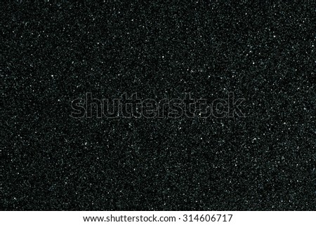 black glitter texture christmas abstract background Royalty-Free Stock Photo #314606717