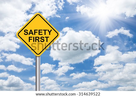 safety first sign on blue sky