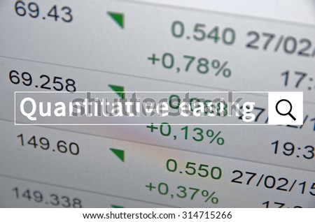 Quantitative easing written in search bar with the financial data visible in the background. Multiple exposure photo.
