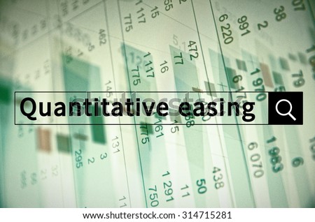 Quantitative easing written in search bar with the financial data visible in the background. Multiple exposure photo. Royalty-Free Stock Photo #314715281