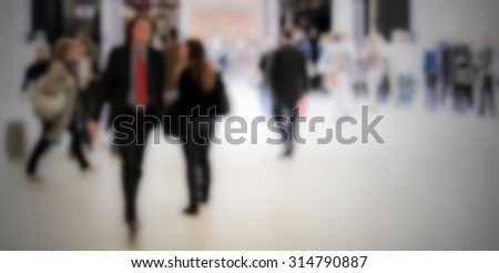 People generic background, intentionally blurred post production.
