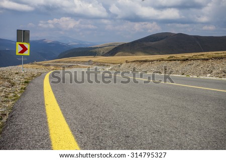 Best mountain curve road. Transfagarasan, Romania Royalty-Free Stock Photo #314795327