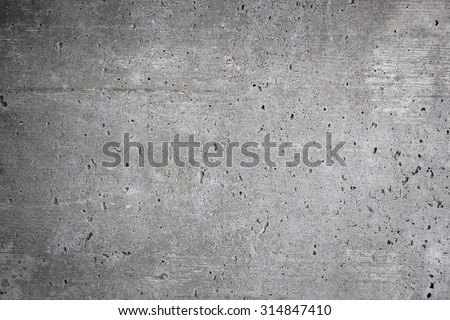 Worn concrete wall background texture outdoors Royalty-Free Stock Photo #314847410
