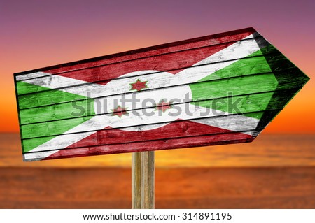 Burundi Flag wooden sign on beach background