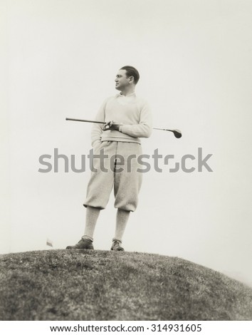 Lone golfer Royalty-Free Stock Photo #314931605