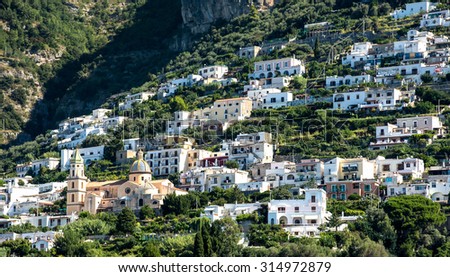 Panoramic view of the scenic town of Praiano and San Gennaro church on Amalfi Coast in the region Campania, Italy
