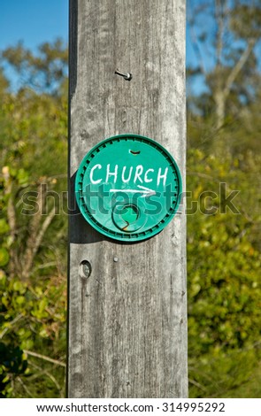 A very basic and low-key sign for a church in the Australian countryside