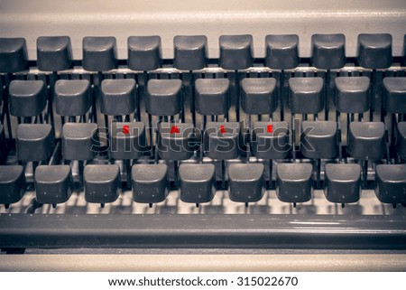Antique Typewriter. Vintage Typewriter Machine Closeup Photo,sale sign, business concept.