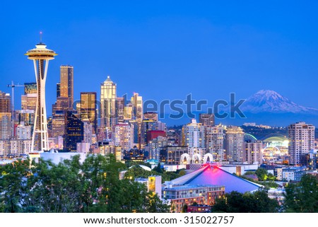 Seattle skyline and Mount Rainier in the background.