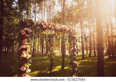 wedding arch decorated with flowers. vintage picture