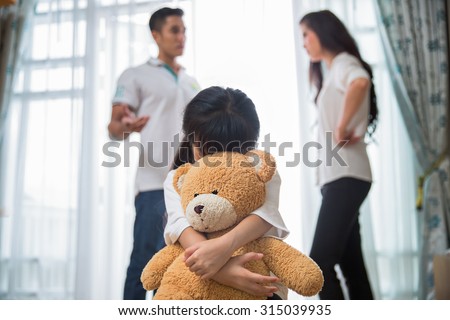 Sad child from this father and mother arguing, family negative concept. Royalty-Free Stock Photo #315039935