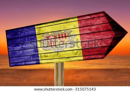 Andorra Flag wooden sign on beach background