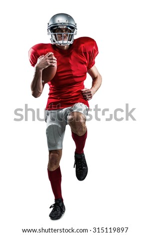Full length of American football player in red jersey running against white background