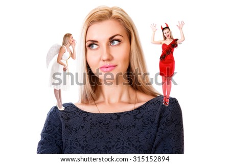 Beautiful young woman with small angel and demon on her shoulders isolated over white background
