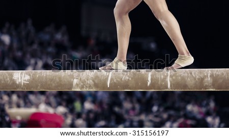 Gymnastic feet on the beam. Montpellier, France.