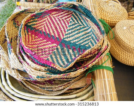 Reed and rush ware in Sri Lanka. Handcrafted reed and rush products include ,table mats , handbags ,hats ,baskets. They are beautified with colorful patterns