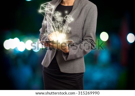 Business woman sending email by using digital tablet