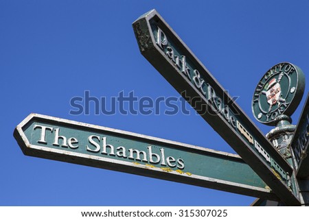 A signpost pointing to the direction of The Sahmbles in York, England.