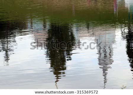 Church reflected in water