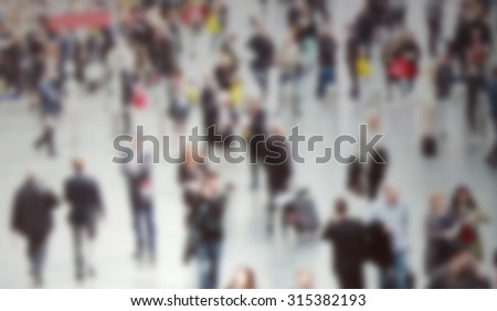 Commuters crowd generic background, intentionally blurred post production.