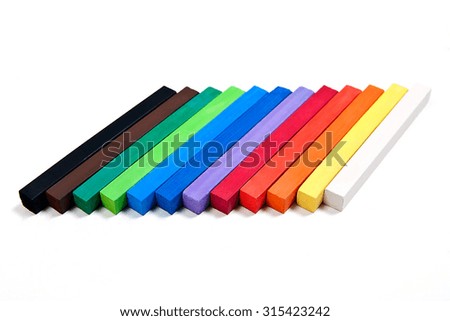 View of different color chalks pastel isolated on the white background. Drawing supplies: assorted color chalks pastel, isolated on white background. Abstract background from color chalks pastel.