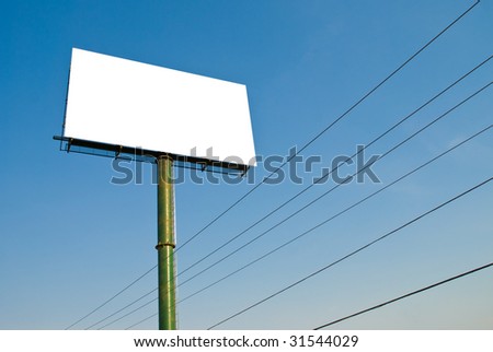 huge white blank billboard with blue sky and cables