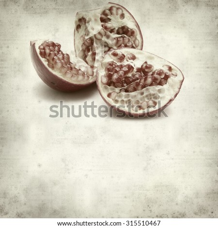 textured old paper background with pomegranate