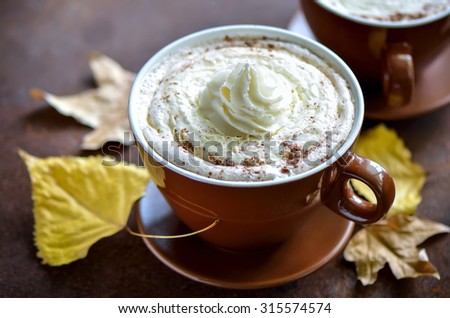 Pumpkin spice latte, traditional autumn warm cozy drink