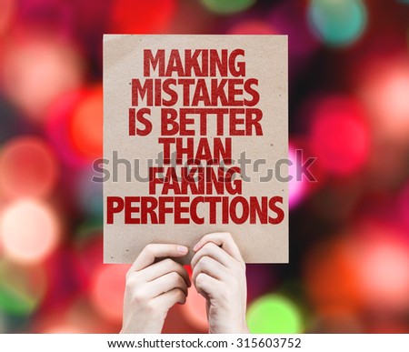 Making Mistakes Is Better Than Faking Perfections cardboard with bokeh background