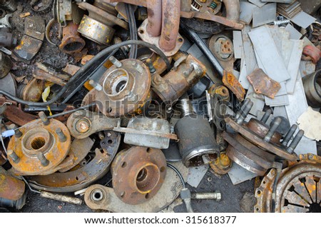 Useless, worn out rusty brake discs and other parts