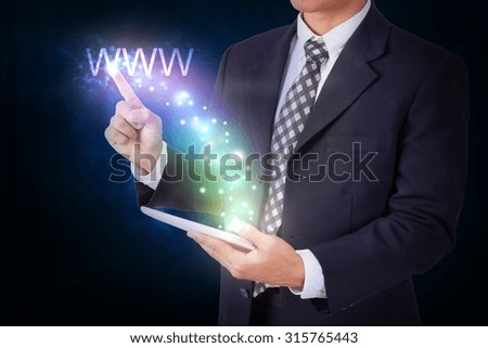 Businessman holding tablet with pressing www. internet and networking concept