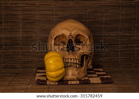 Still life skull with fruit concept halloween