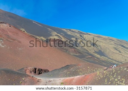 People hiking on a vulcano