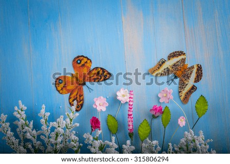 Butterfly, flower blue background Vintage.
