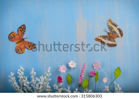 Butterfly, flower blue background Vintage.