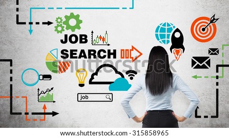 Rear view of the brunette woman who is looking at the wall with colourful icons about job vacancies. A concept of recruitment process. Internship and graduate programmes. Concrete wall. Royalty-Free Stock Photo #315858965