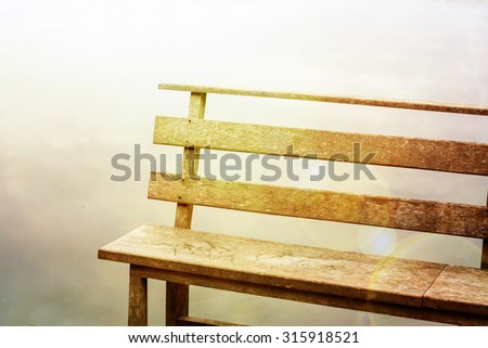 Chair wooden near river background