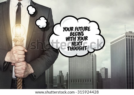 Your future begins with your next thought text on speech bubble with businessman holding lamp on city background