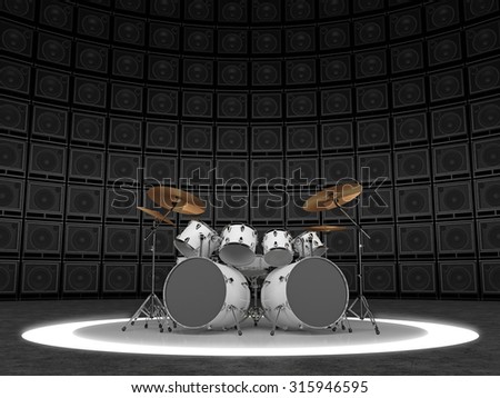 White drum set against the backdrop of a wall of guitar amps